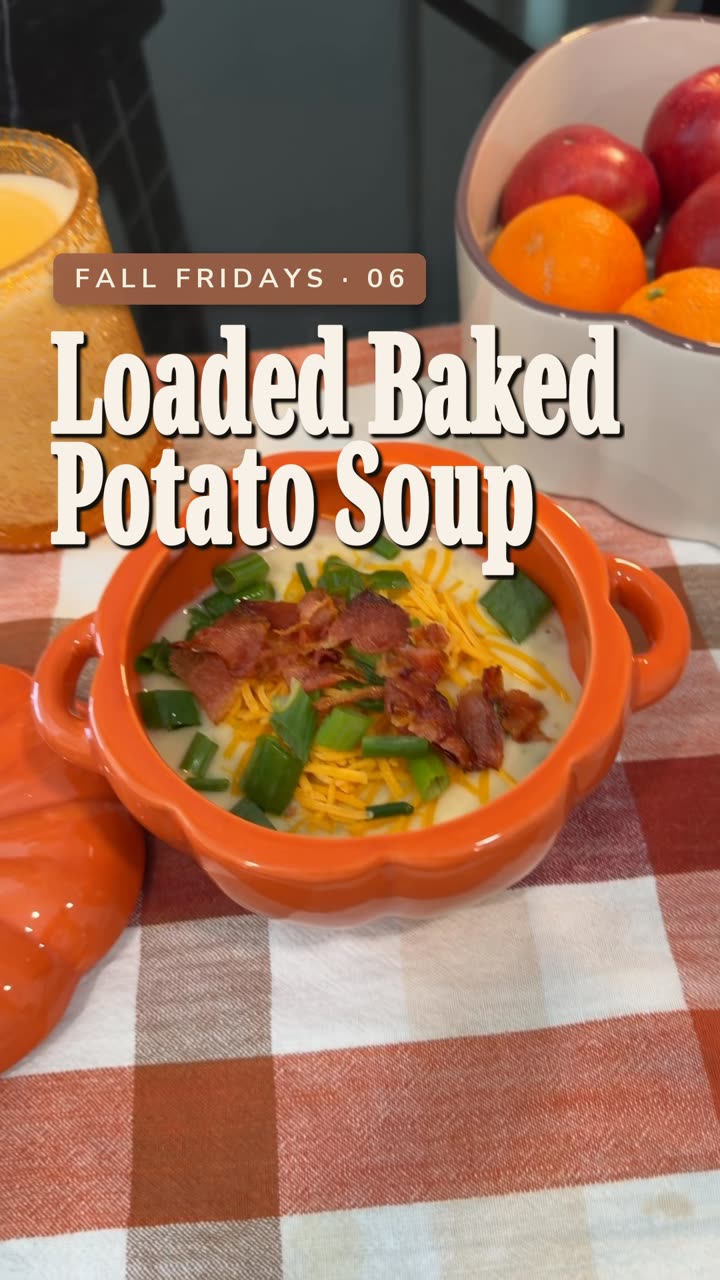 Loaded baked potato soup in an orange pumpkin bowl
